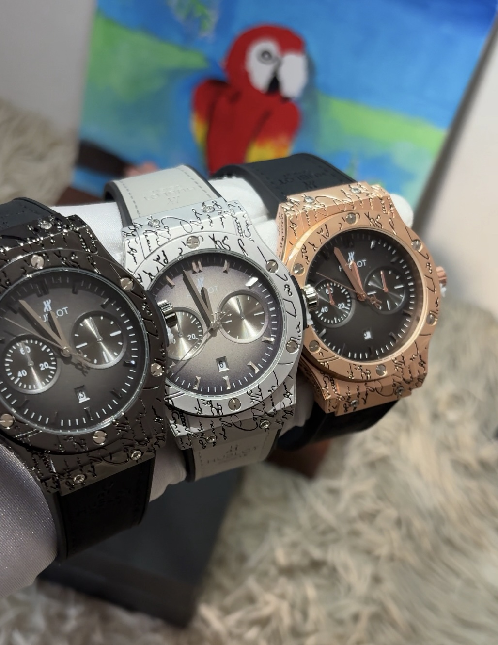 F. 1 FULL BLACK, 1 GREY HUBLOT & 1 BLACK WITH GOLD (60,000 XAF)